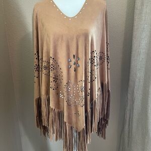 Super cool, western, or 70’s style poncho